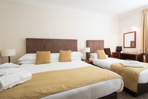 A hotel room with two beds, each with white linens and a brown headboard. There are two bedside tables with lamps, a mirror, and a small desk with a chair. - Pitbauchlie House Hotel, Sure Hotel Collection by BW (Dunfermline)