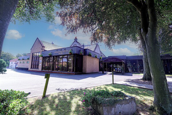 A building with a sign reading "Pittauche House Hotel" and a reception area. - Pitbauchlie House Hotel, Sure Hotel Collection by BW (Dunfermline)