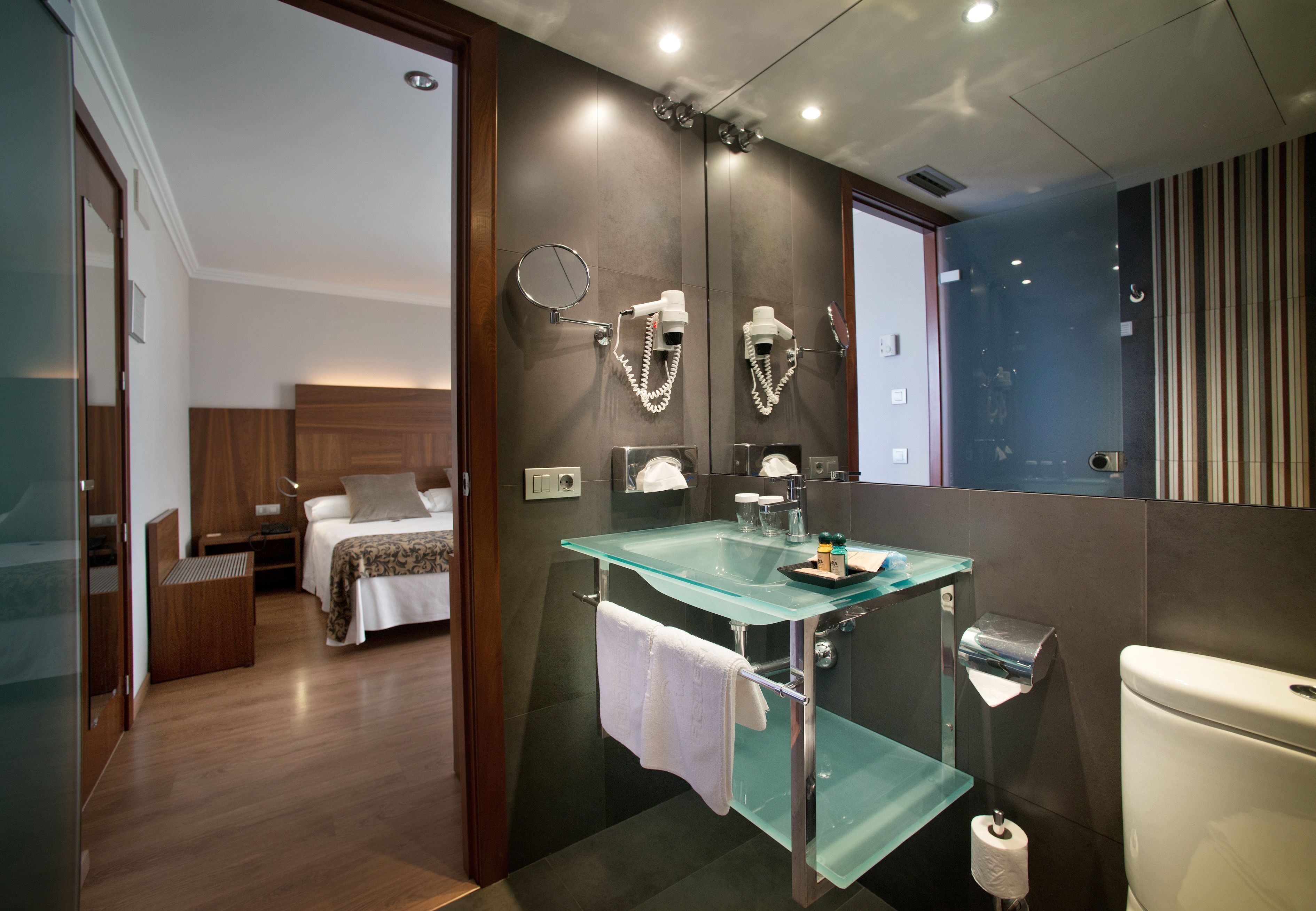 desk, laptop workspace, blackout curtains, iron/ironing board