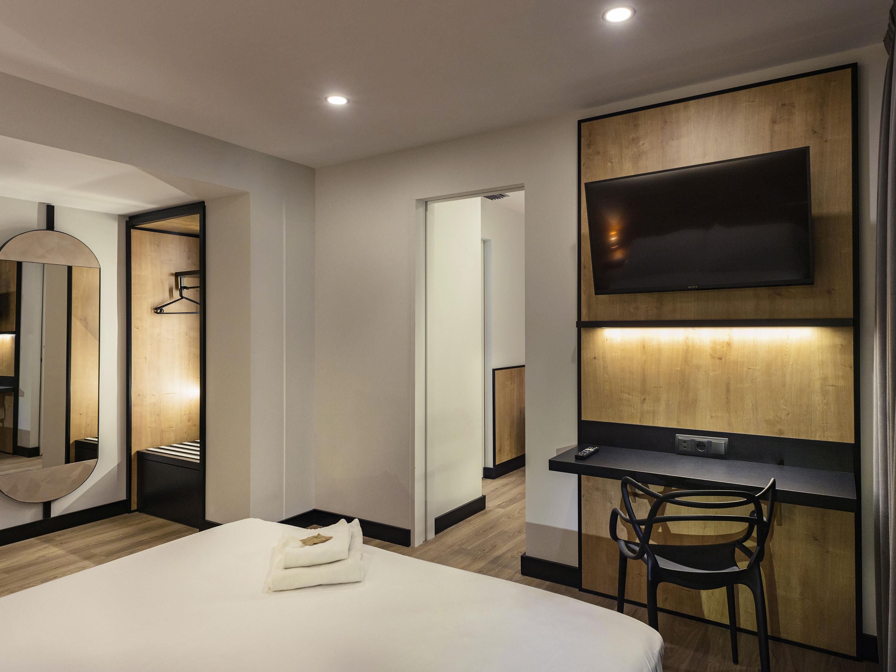 desk, laptop workspace, blackout curtains, iron/ironing board