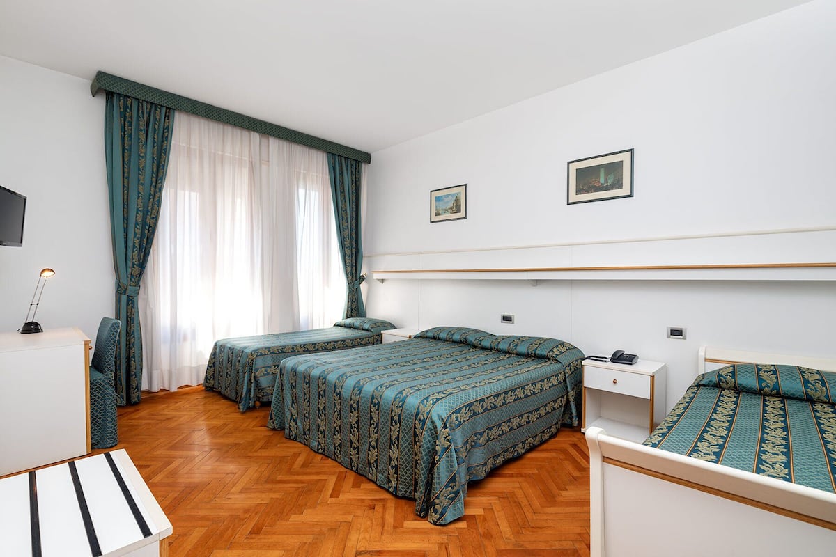In-room safe, desk, laptop workspace, iron/ironing board