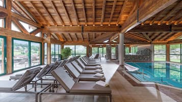 Indoor pool, outdoor pool, pool umbrellas, pool loungers