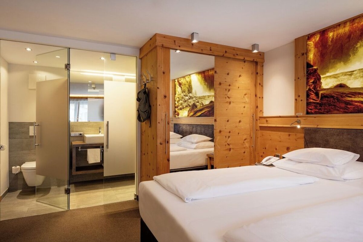 Ropa de cama hipoalergénica, minibar, caja fuerte y wifi gratis