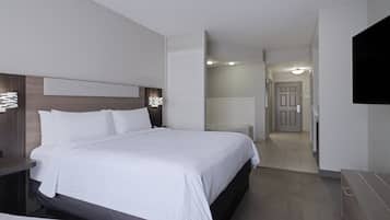 Chambre Standard, 1 très grand lit, baignoire à jets | Coffre-fort, bureau, système d’insonorisation, fer et planche à repasser