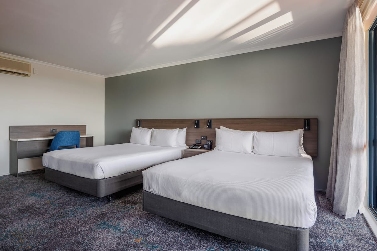 superior plus studio twin queen | desk, iron/ironing board, free wifi, bed sheets