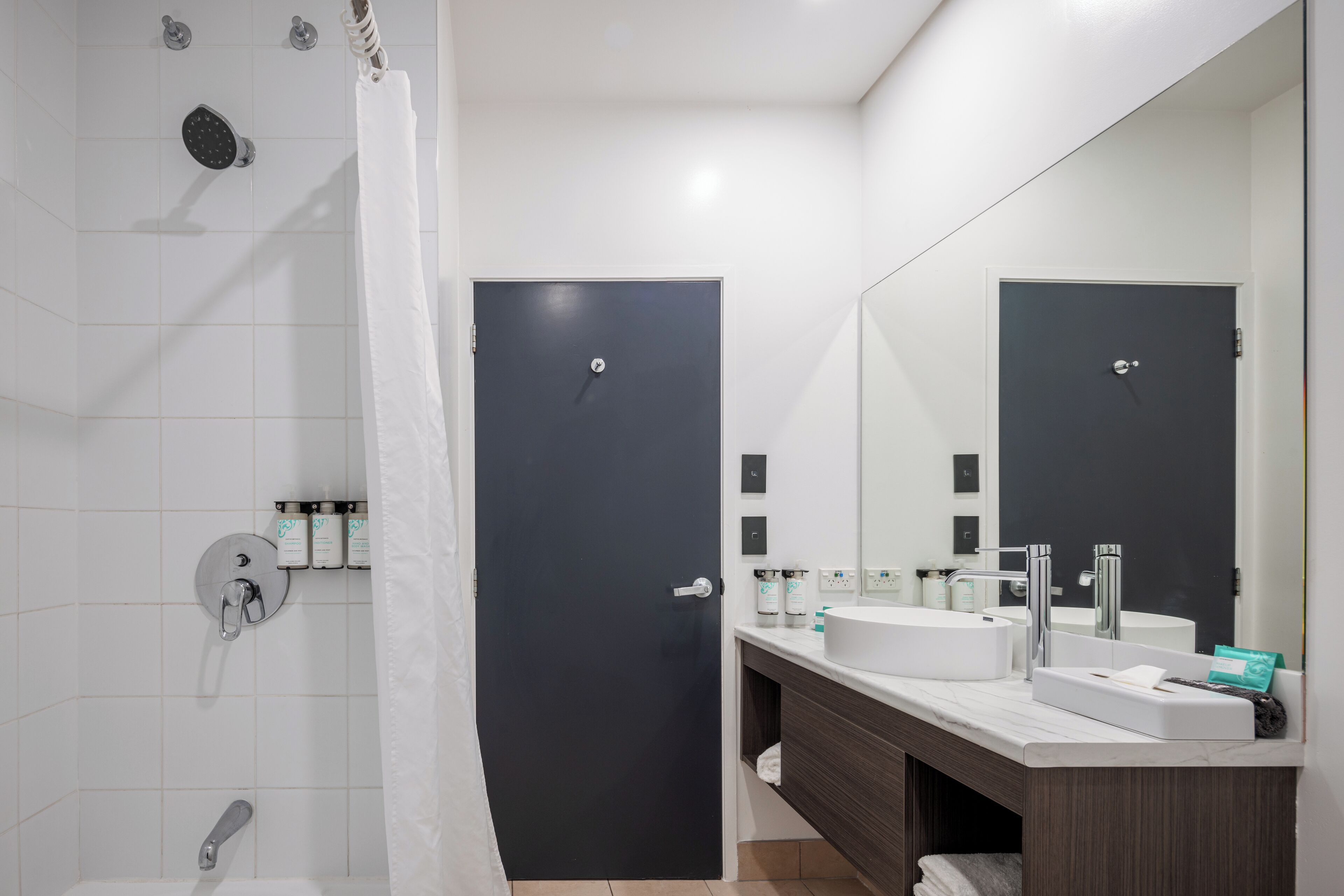 superior 1 bedroom king suite | bathroom | free toiletries, hair dryer, towels