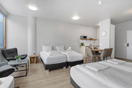 Studio - 5 Adults | Living area | Flat-screen TV