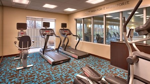 A gym with treadmills, an elliptical, and a stationary bike. - Fairfield Inn & Suites by Marriott Boise Nampa (Nampa)