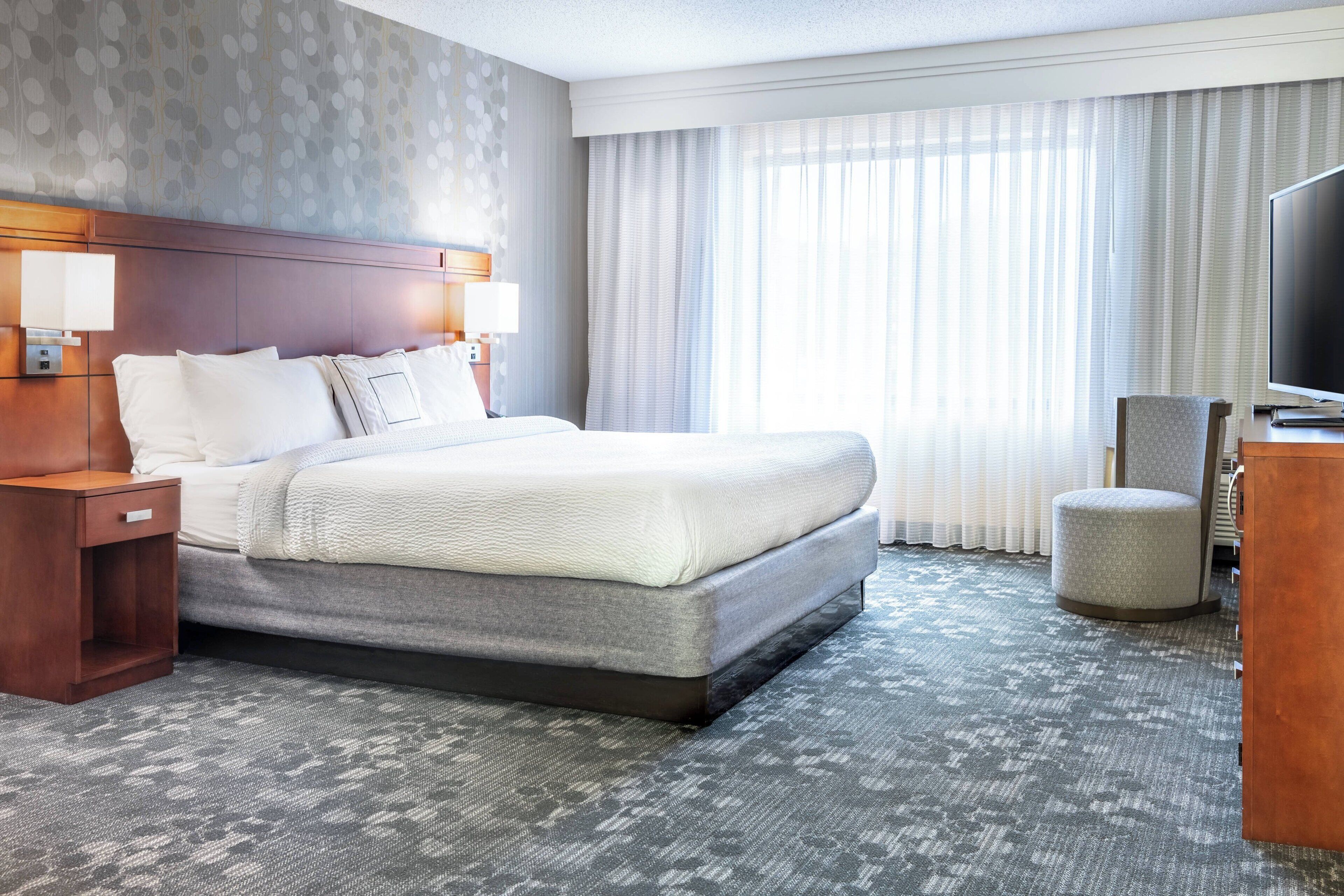 premium bedding, down duvets, pillow-top beds, in-room safe