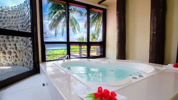 Beachfront Bure | Bathroom | Free toiletries, hair dryer, towels