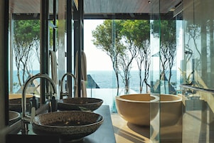 Scenic Ocean View Pool Villa | Bathroom | Separate tub and shower, deep soaking tub, rainfall showerhead