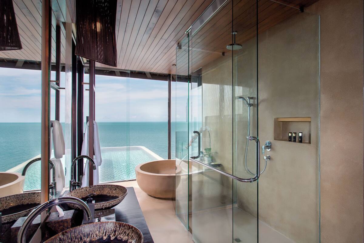 ocean front pool villa | bathroom | separate bathtub and shower, deep-soaking bathtub, free toiletries