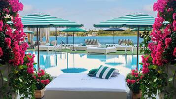 Outdoor pool, open noon to 6:00 PM, cabanas (surcharge), pool umbrellas