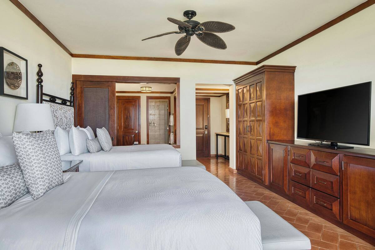 Deluxe Room, 2 Double Beds, Balcony | Pool | Outdoor pool, open 6:00 AM to 7:00 PM, pool umbrellas, sun loungers