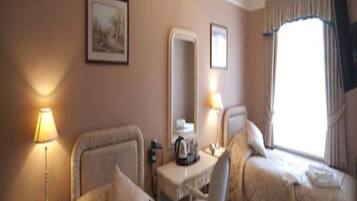 Select Comfort beds, desk, iron/ironing board, free cots/infant beds