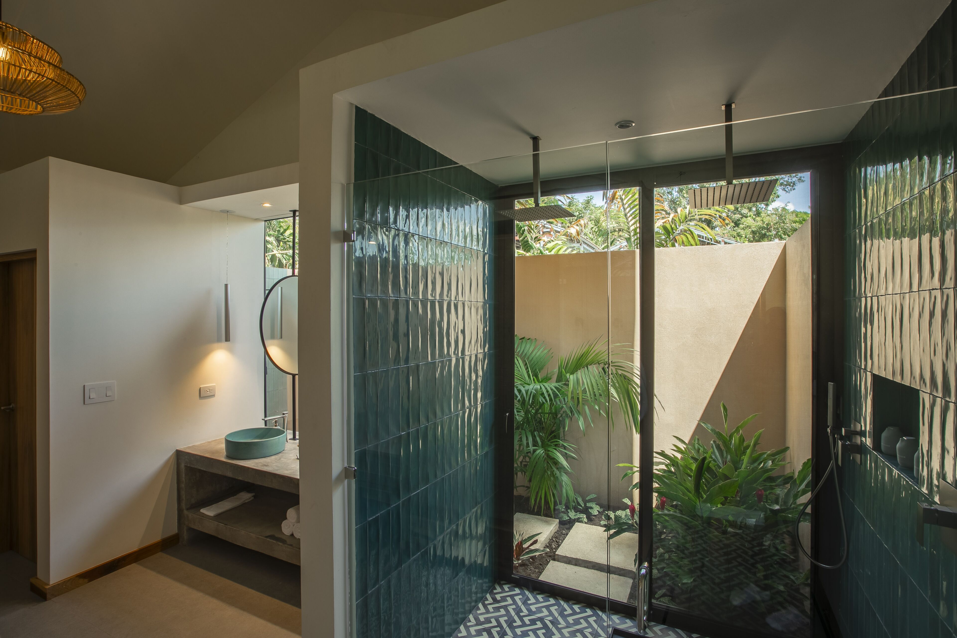 arenal pool casita | bathroom | shower, rainfall showerhead, designer toiletries, hair dryer