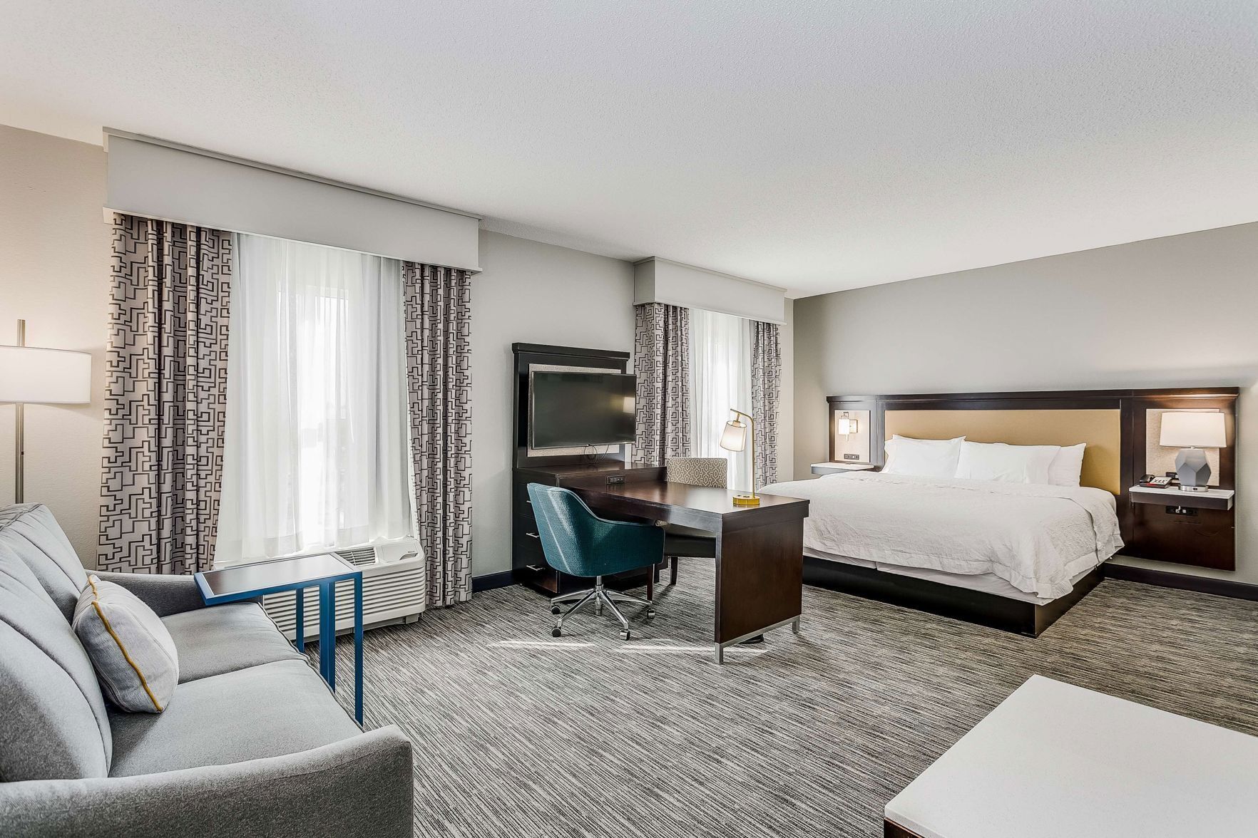 Hypo-allergenic bedding, in-room safe, desk, laptop workspace