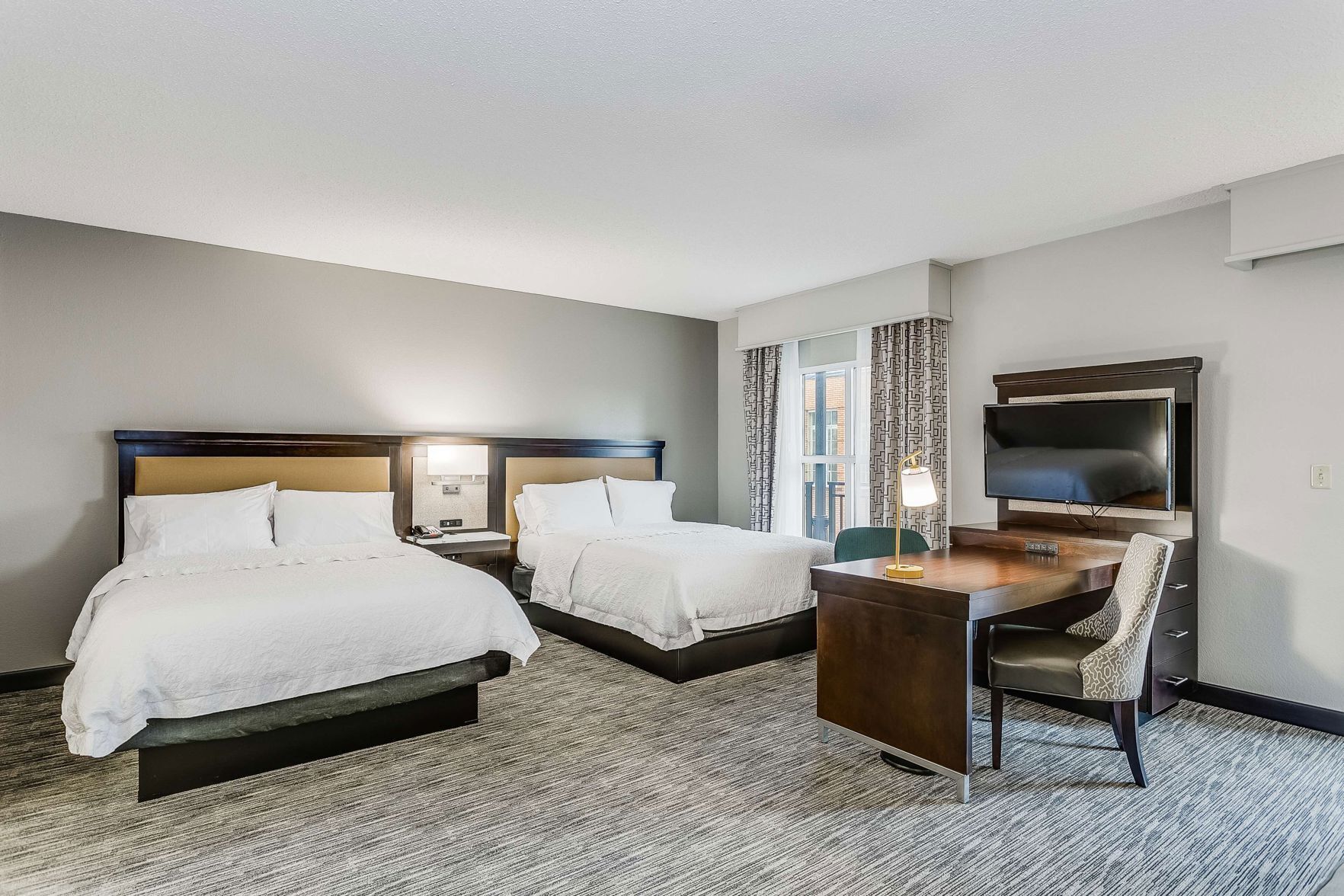 Hypo-allergenic bedding, in-room safe, desk, laptop workspace