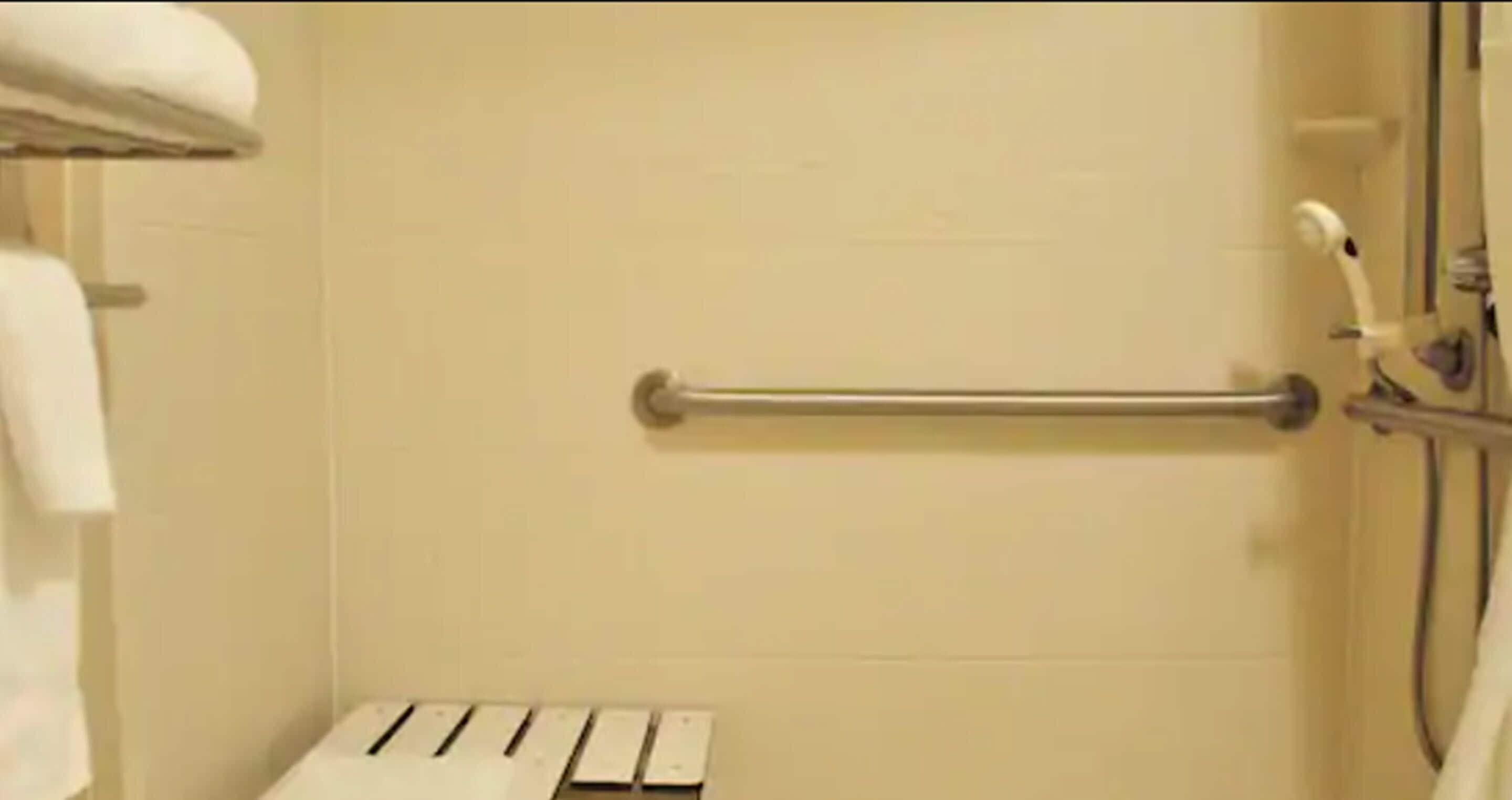 designer toiletries, hair dryer, towels