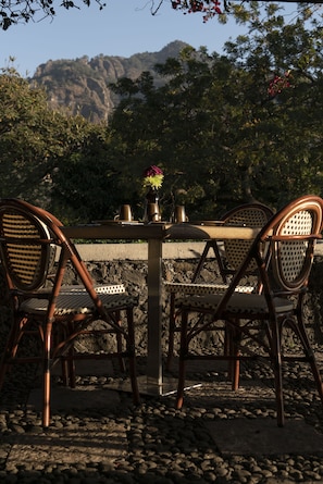 Breakfast, lunch, dinner served; Mexican cuisine, garden views
