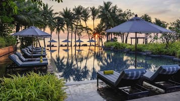 2 outdoor pools, open 7:00 AM to 7:00 PM, pool umbrellas, pool loungers