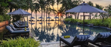 2 outdoor pools, open 7:00 AM to 7:00 PM, pool umbrellas, sun loungers