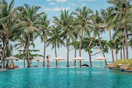 2 outdoor pools, open 7:00 AM to 7:00 PM, pool umbrellas, sun loungers