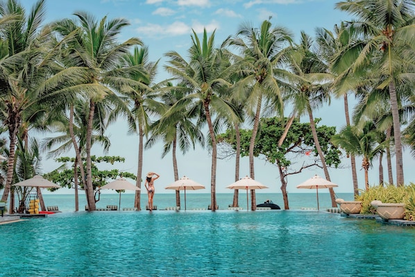 2 outdoor pools, open 7:00 AM to 7:00 PM, pool umbrellas, sun loungers