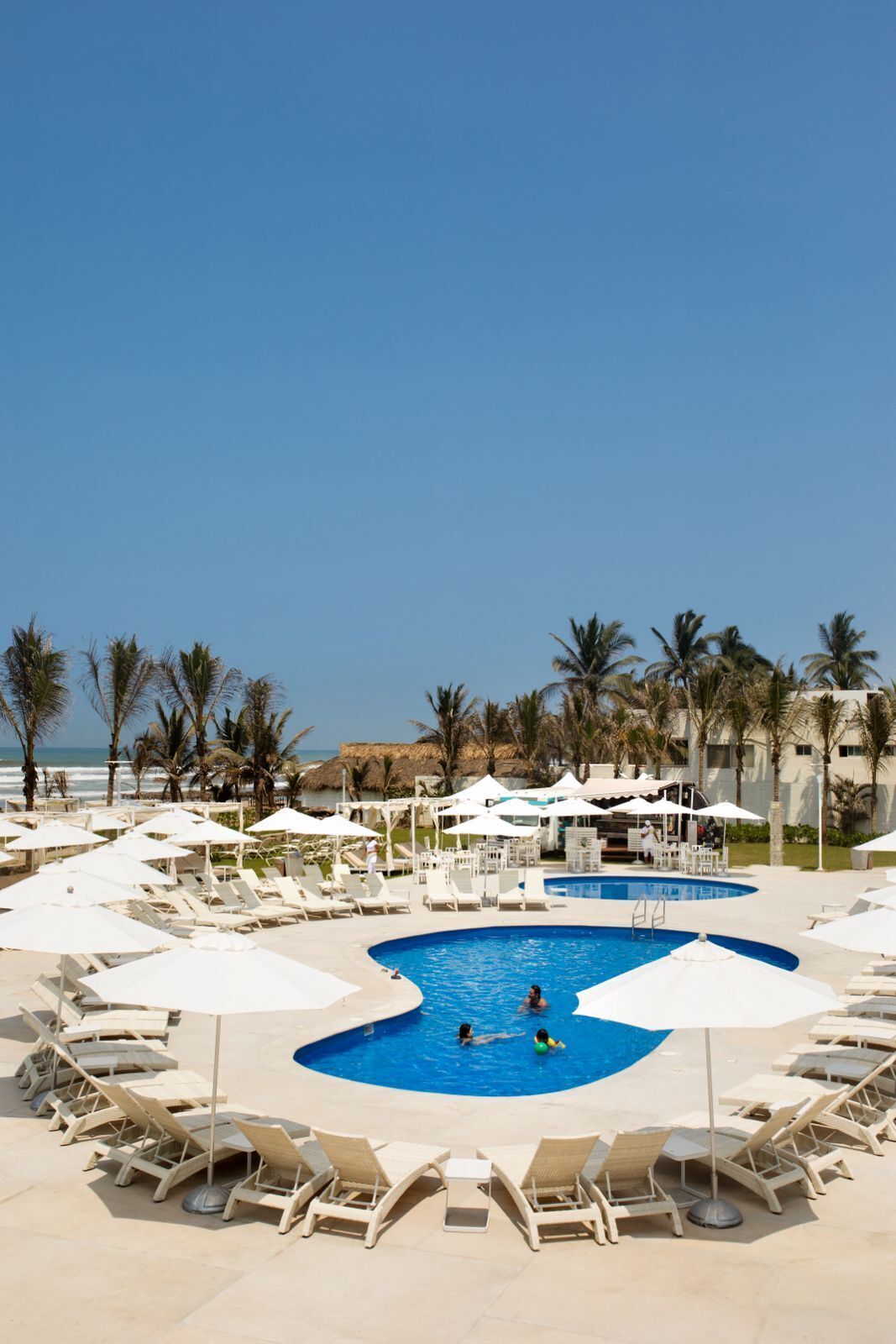 6 outdoor pools, open 7:00 am to 8:00 pm, pool umbrellas, pool loungers