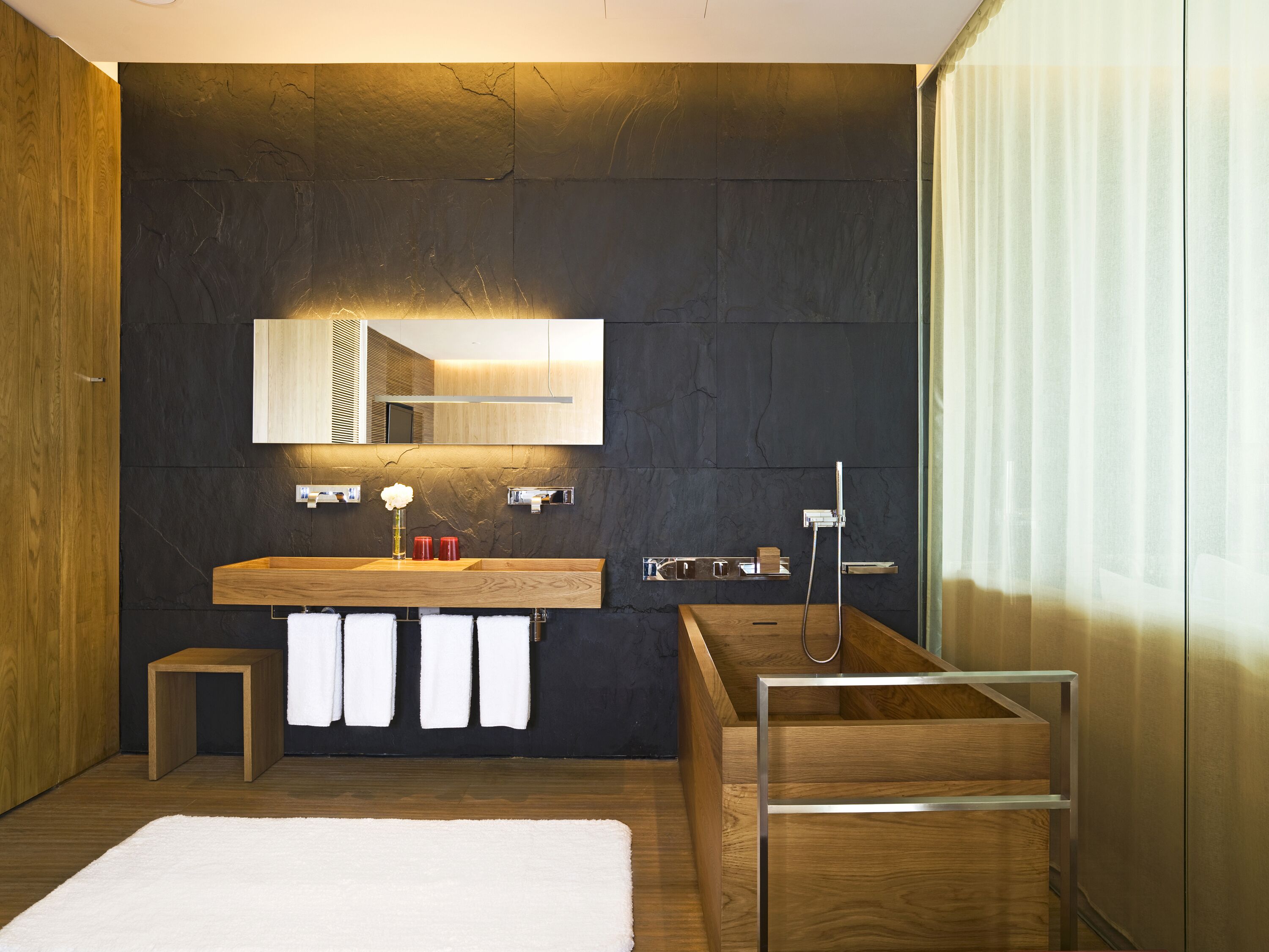 suite 95 | bathroom | separate bathtub and shower, deep-soaking bathtub, designer toiletries
