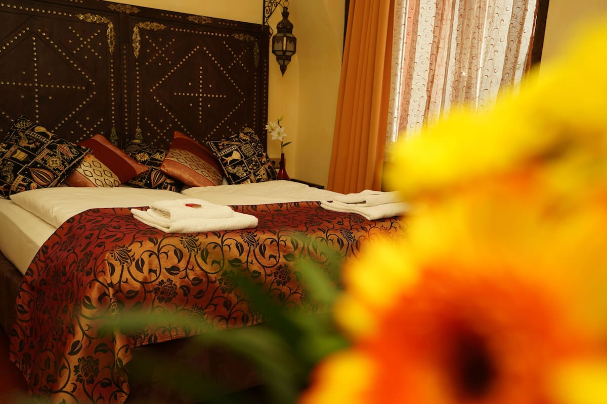 Hypo-allergenic bedding, pillow-top beds, minibar, in-room safe
