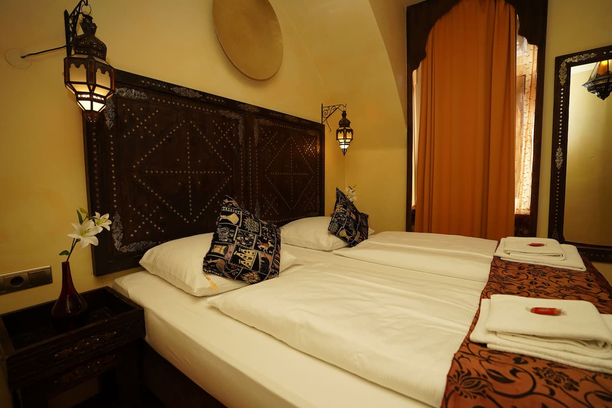 Hypo-allergenic bedding, pillow-top beds, minibar, in-room safe