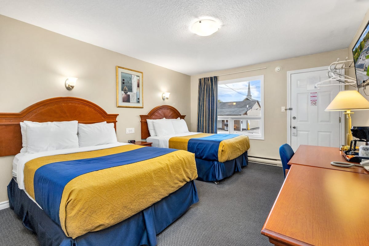 Room, 2 Double Beds | Individually furnished, desk, laptop workspace, blackout drapes