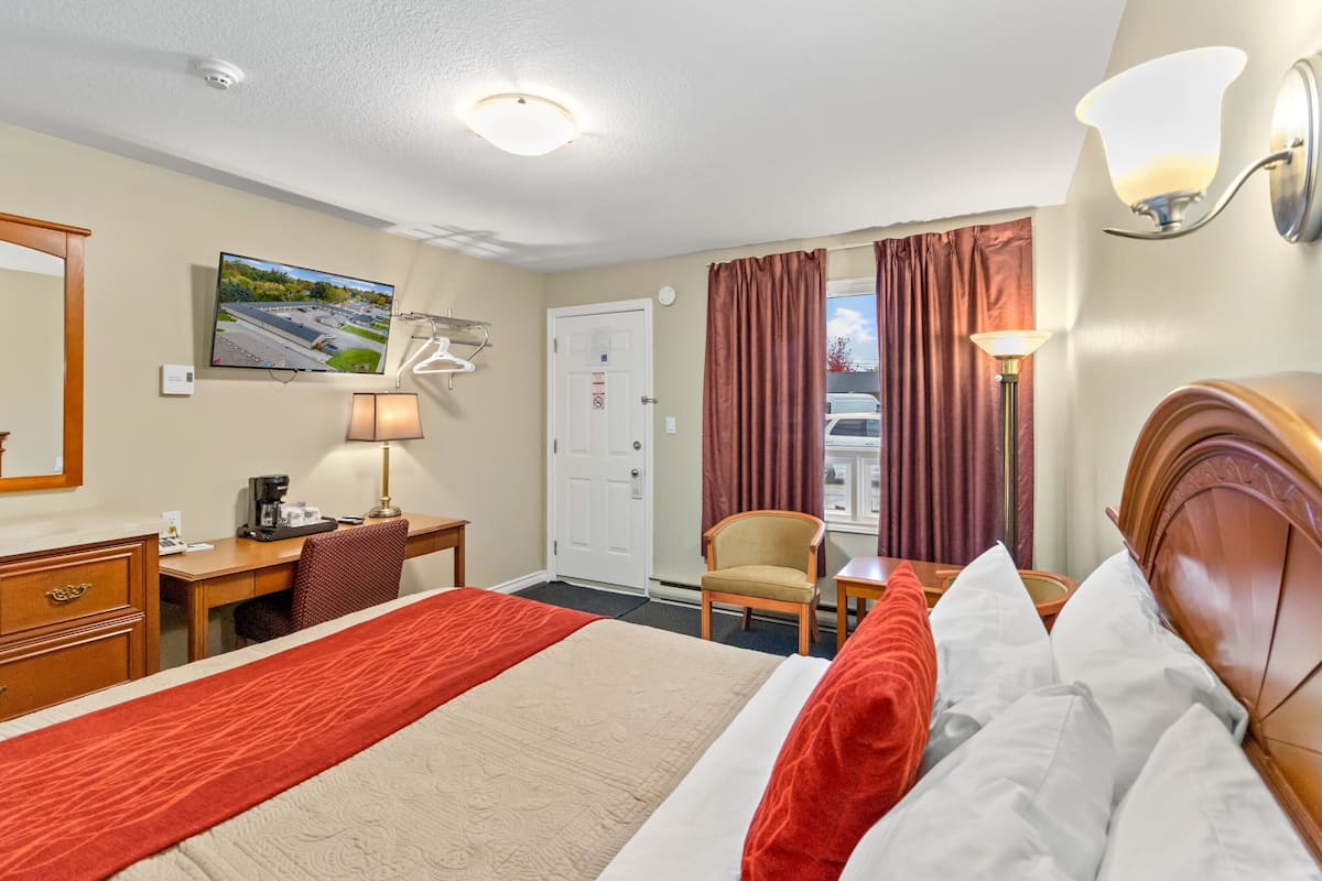 Room, 1 Queen Bed | Individually furnished, desk, laptop workspace, blackout drapes
