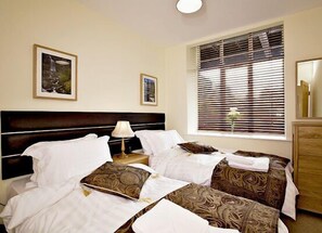 Departamento superior, 2 habitaciones | 2 habitaciones y camas con efecto memoria 