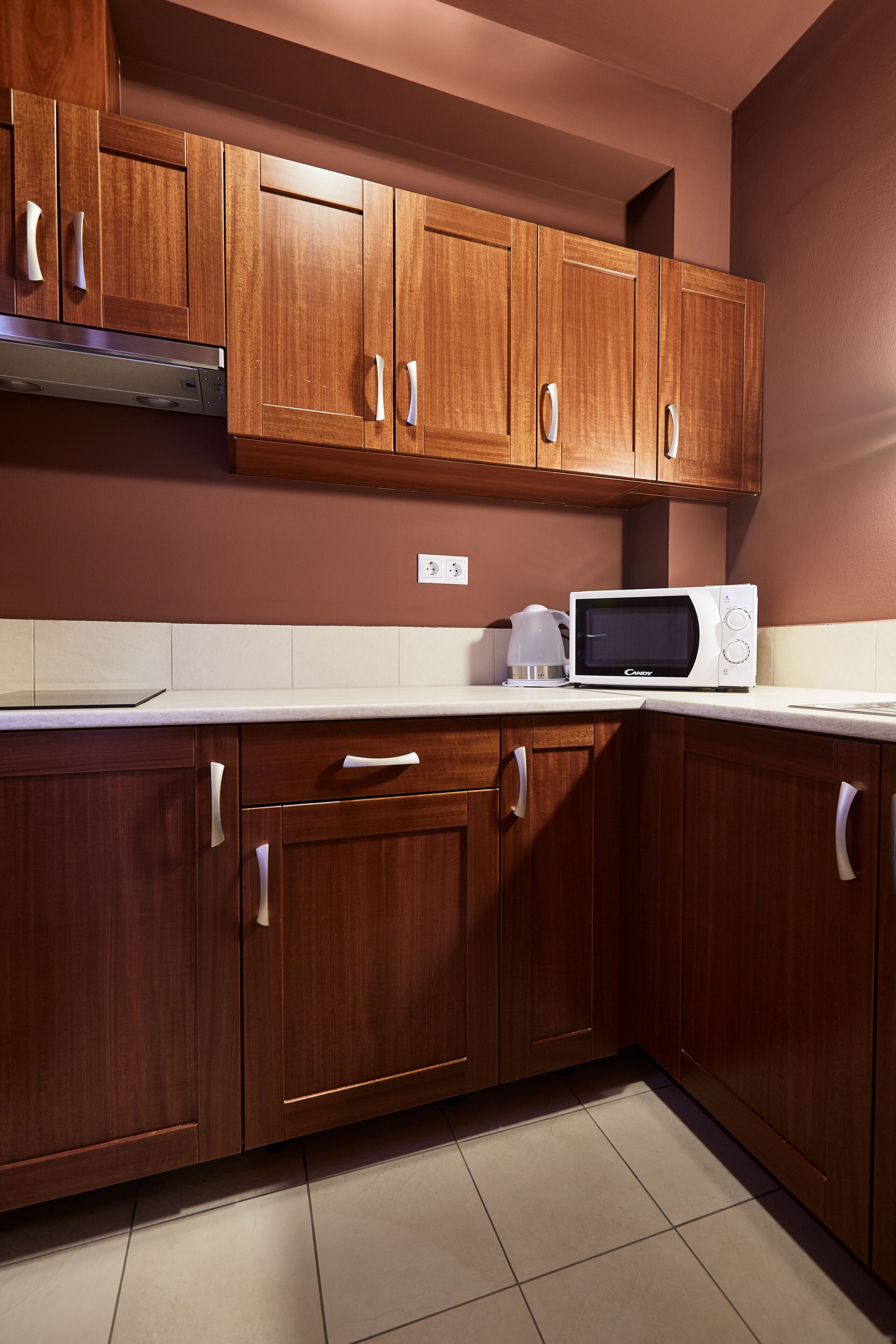 mini-fridge, high chair, cookware/dishes/utensils