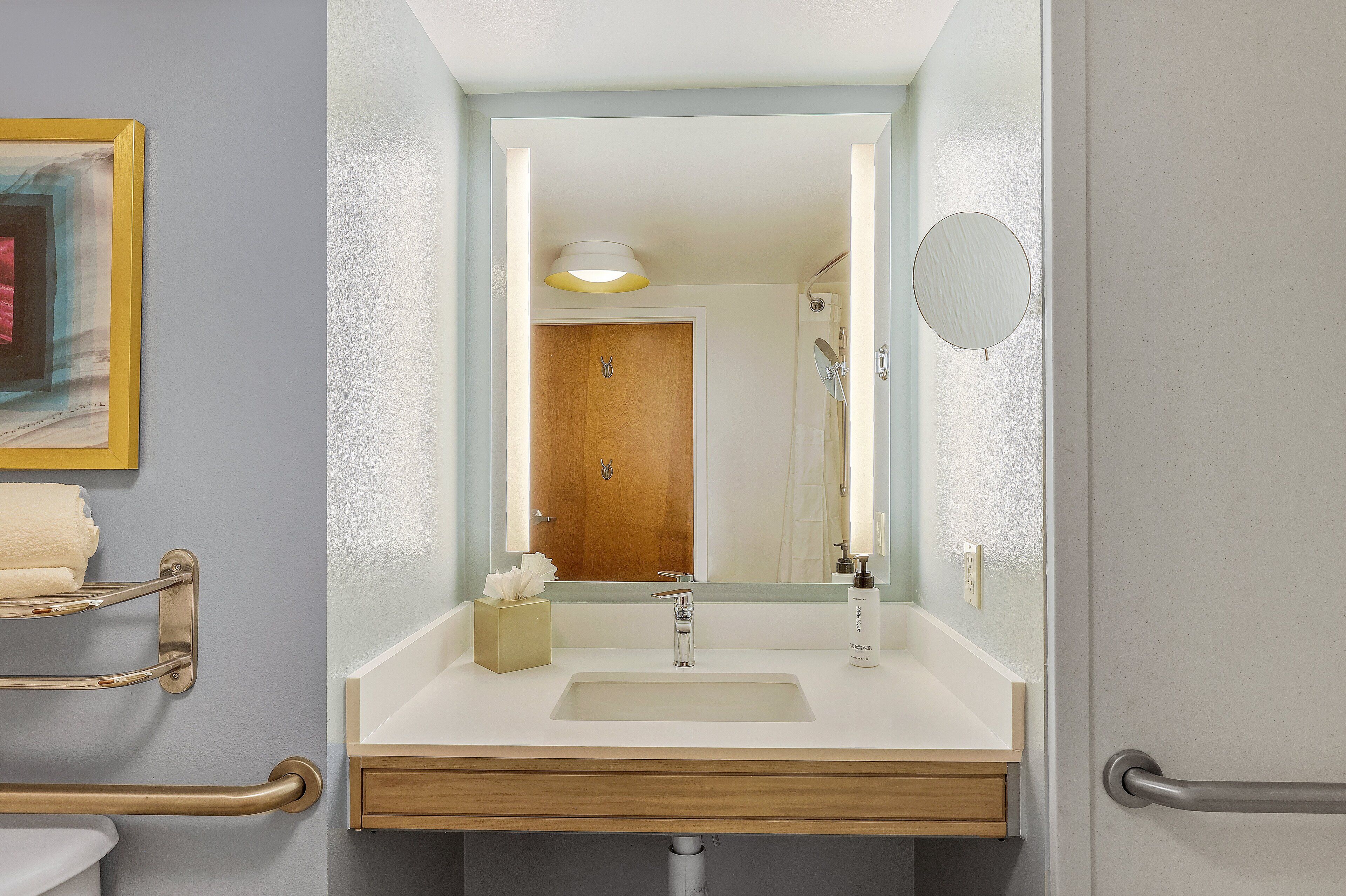 rainfall showerhead, eco-friendly toiletries, hair dryer, towels