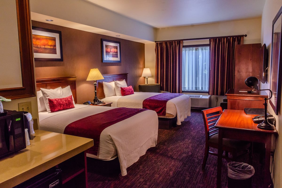 deluxe room, 2 queen beds | premium bedding, pillow-top beds, desk, laptop workspace