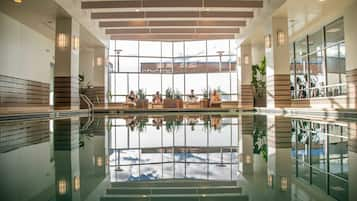 Indoor pool, open 6:00 AM to 11:00 PM, sun loungers