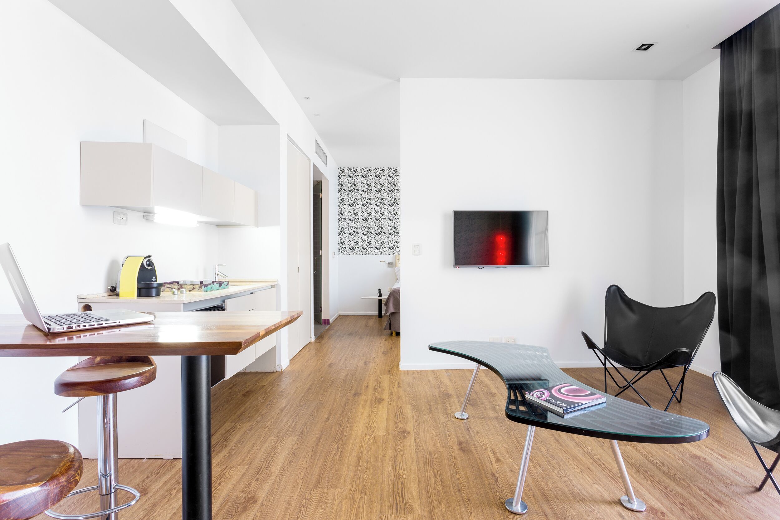 deluxe suite | living area | 30-inch smart tv with digital channels, tv, streaming services