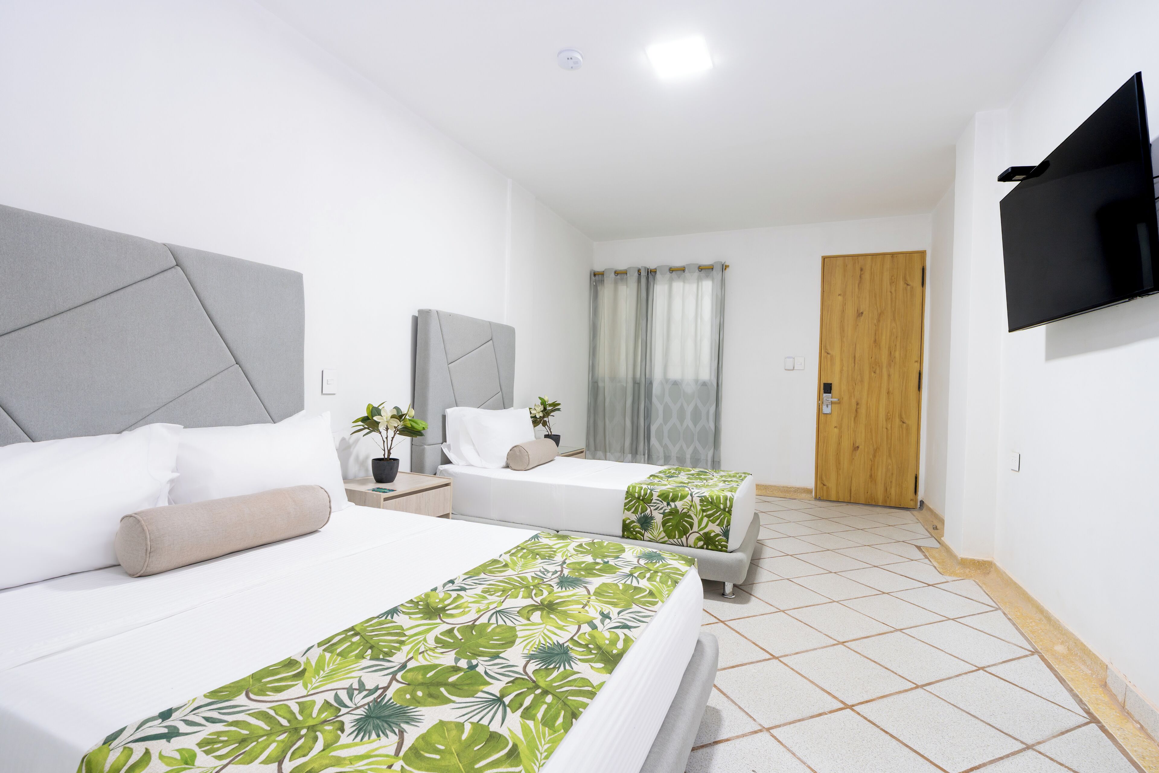 Family Room | Premium bedding, down comforters, Select Comfort beds, minibar