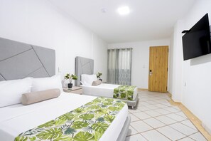 Family Room | Premium bedding, down comforters, Select Comfort beds, minibar