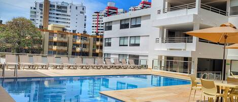 Outdoor pool, open 9:00 AM to 8:00 PM, sun loungers