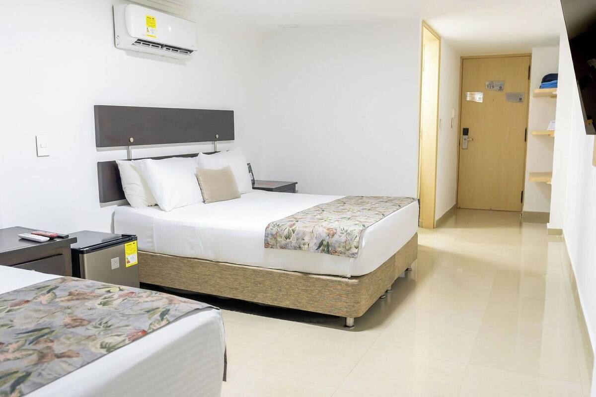 Premium bedding, down comforters, Select Comfort beds, minibar