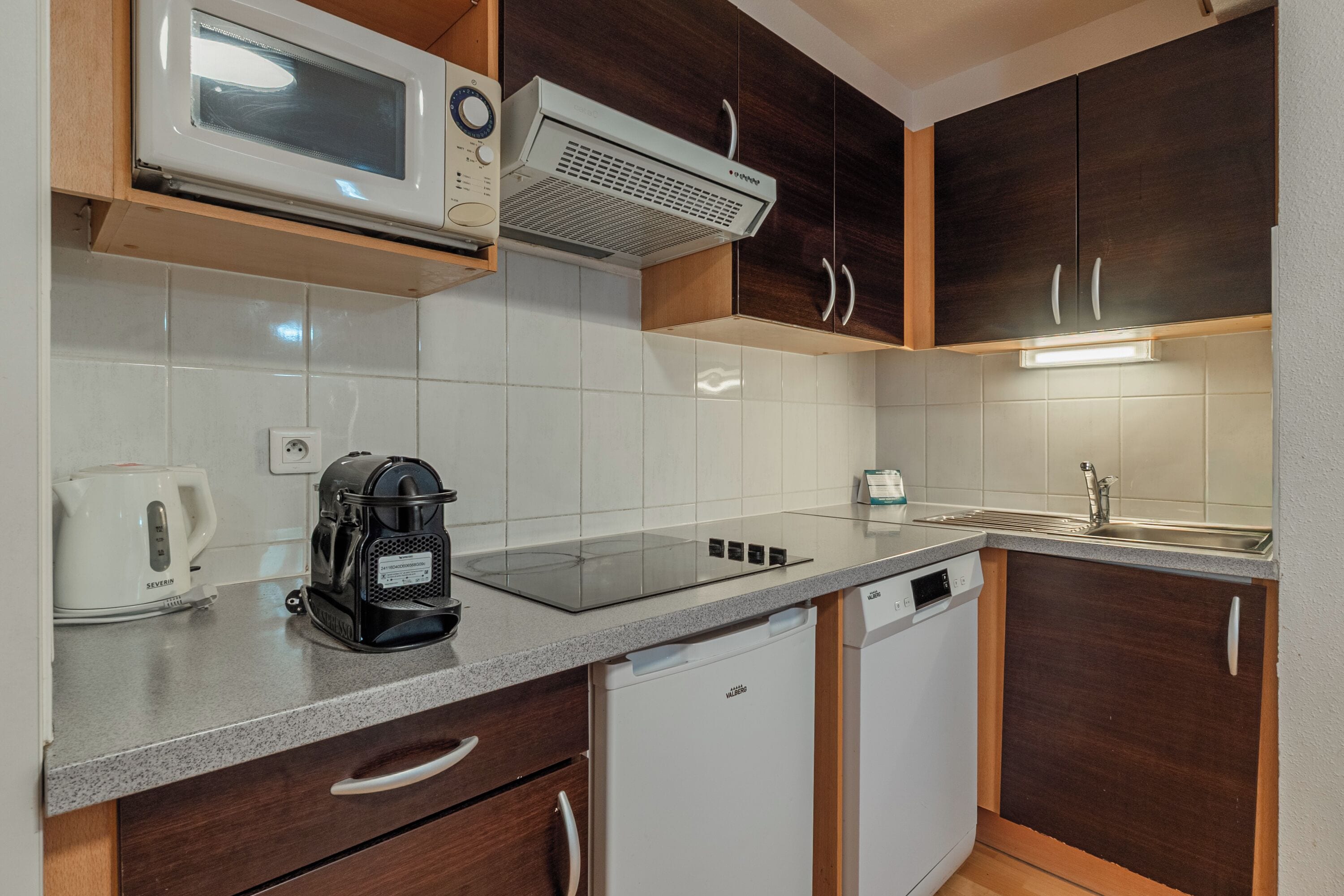 Appartamento | Cucina privata | Frigorifero, microonde, piano cottura, lavastoviglie