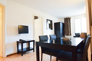 Flat 6 persons | Living area | Flat-screen TV