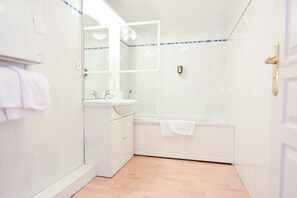 Shower, free toiletries, hair dryer, towels