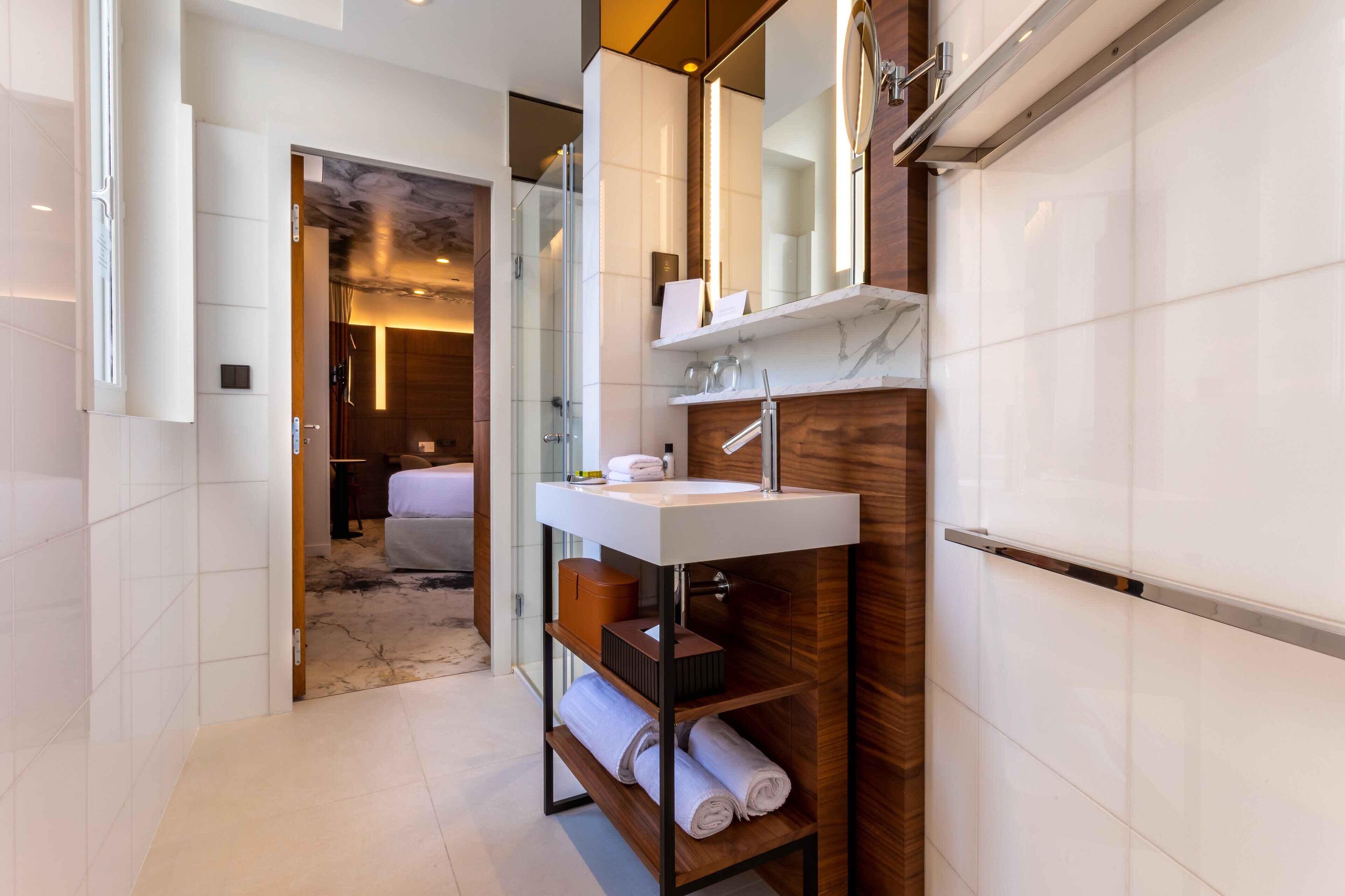 rainfall showerhead, designer toiletries, hair dryer, bathrobes