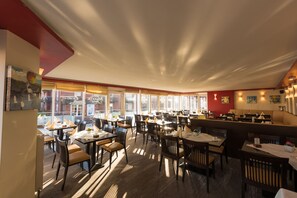 Breakfast and dinner served, local and international cuisine