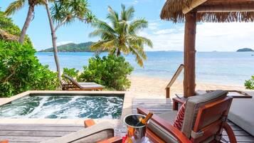 Deluxe Beachfront Bure | Egyptian cotton sheets, premium bedding, pillowtop beds, minibar